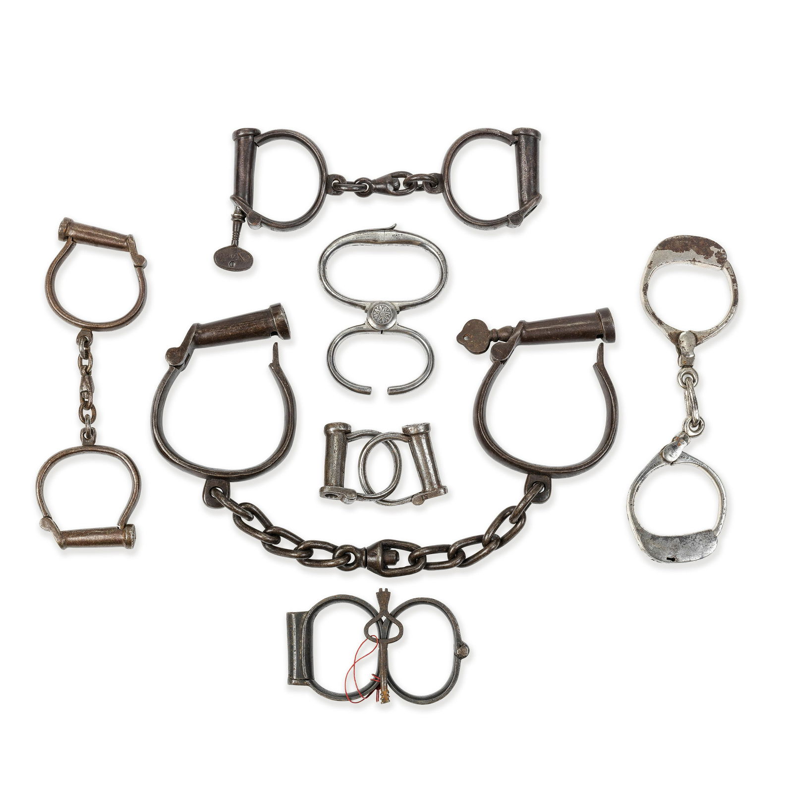 A Collection Of 19th Century Steel Hiatt Handcuffs (1 of 1)
