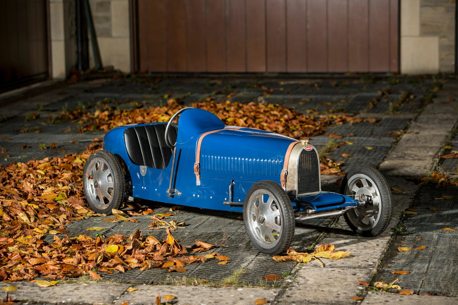 An electrically powered 'Type 52 Baby Bugatti' replica: An electrically powered 'Type 52 Baby Bugatti' replica child's car, circa 2002, recreation based upon the original model of approximately 500 produced 1927-1936 by Ettore Bugatti for wealthy clientele