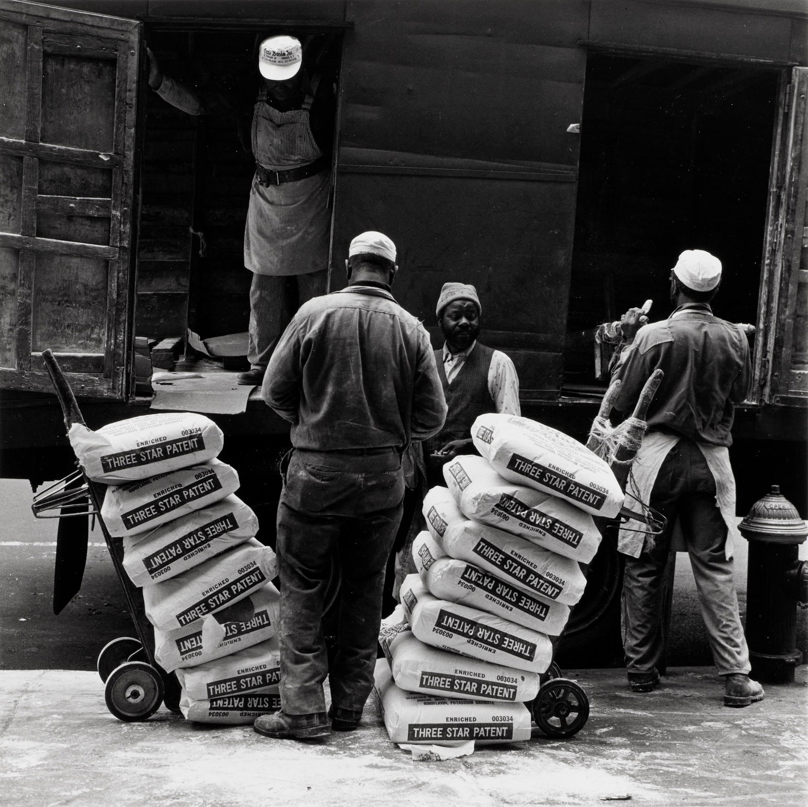 Roy DeCarava (1919-2009); Cycle of Blue Collar Workers,: Roy DeCarava (1919-2009) Cycle of Blue Collar Workers, New York, NY, 1963 Gelatin silver print, printed c. 1983, credit, title and date in pencil on the verso. 8 1/2 x 8 1/2in (21.5 x 21.5cm) sheet 14