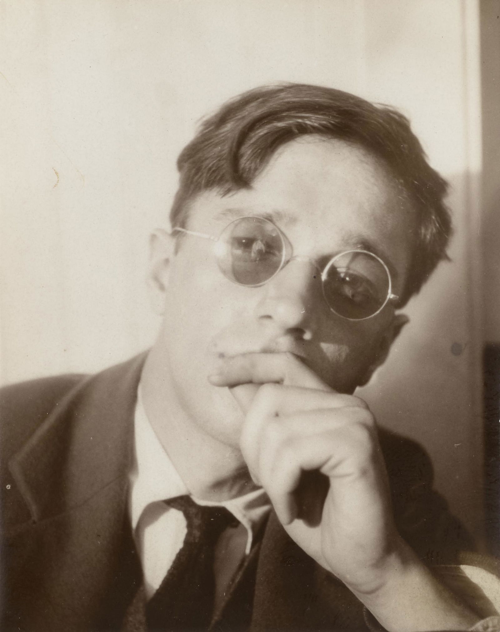 Walker Evans (1903-1975); Self Portrait, Darien;: Walker Evans (1903-1975) Self Portrait, Darien, 1929 Gelatin silver contact print, printed 1929, titled 'Darien', dated, (an)notations '3 GS50W' and '1st of face' by the artist in pencil on the verso.