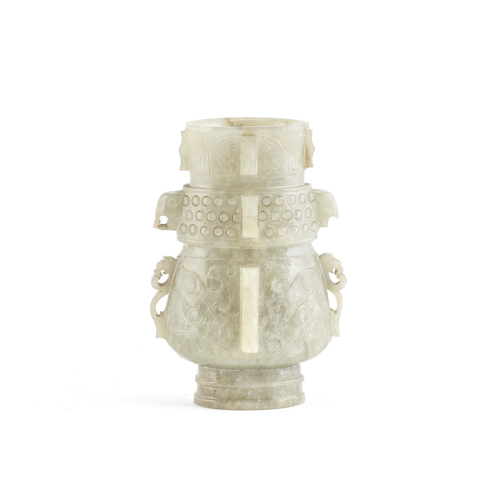 AN ARCHAISTIC PALE GREEN JADE VASE, HU Ming Dynasty: AN ARCHAISTIC PALE GREEN JADE VASE, HU Ming Dynasty The body with a three-tiered decoration, with three rows of bosses and 'bird's head' handles above a band of taotie masks and chilong handles, and b