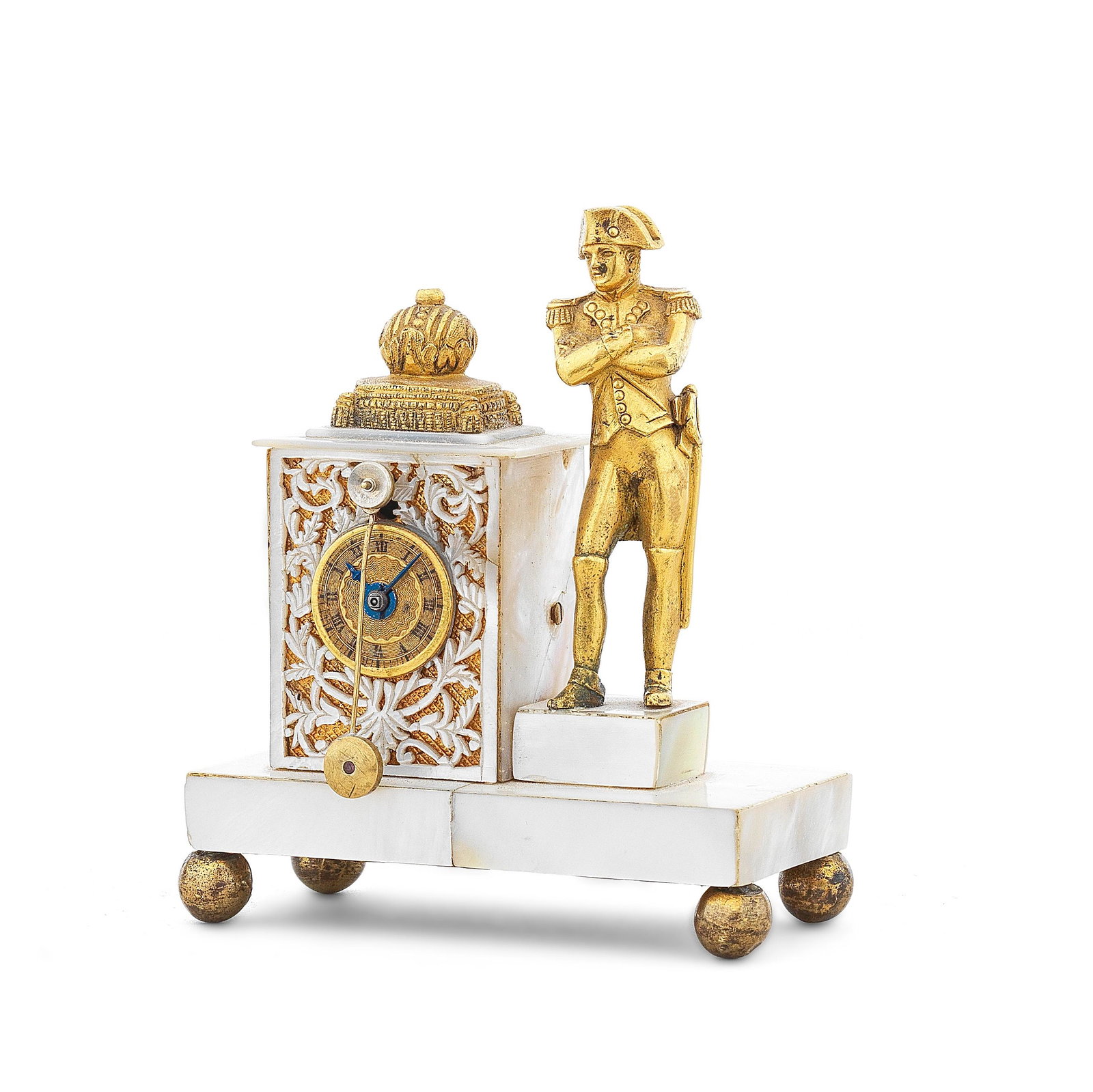 A good and rare early 19th century mother of pearl and: A good and rare early 19th century mother of pearl and ormolu 'Zappler' timepiece with figure of Napoleon Bonaparte The case cast with a figure of Napoleon in typical stance flanking a pedestal upon w