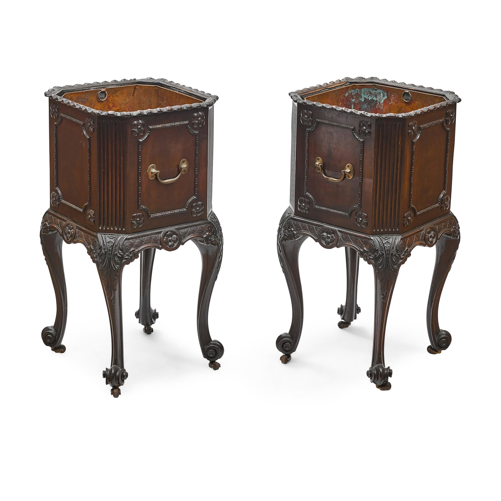 A PAIR OF ENGLISH MAHOGANY JARDINIÈRES20th century: A PAIR OF ENGLISH MAHOGANY JARDINIÈRES 20th century Raised on casters. height 25in (63.5cm); width 12 1/2in (30.5cm) square