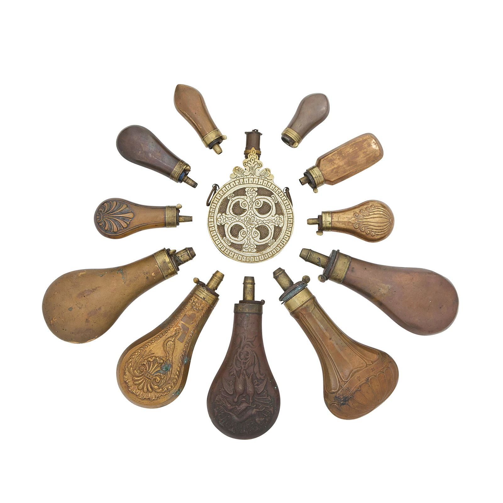 Six Brass-Mounted Powder-Flasks For Percussion Pistols: Six Brass-Mounted Powder-Flasks For Percussion Pistols, And Six Powder-Flasks For Percussion Longarms Mostly 19th Century The first including two each with embossed bag-shaped body, the remainder each
