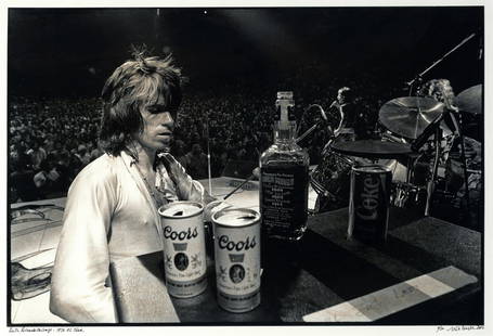 Ethan Russell (American, b.1945): KEITH RICHARDS WITH: Ethan Russell (American, b.1945): KEITH RICHARDS WITH JACK & COORS, 1972, printed 2002, No.6/50, silver gelatin print, depicting Keith Richards on stage during the 1972 US tour, signed, numbered, titl
