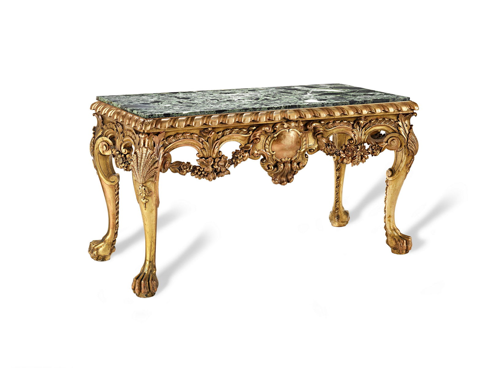 A William Kent style giltwood and marble top table: A William Kent style giltwood and marble top table In the Kentian style, with green marble top, the frieze with central vacant cartouche, the cabriole legs carved with shells and paw feet, 144cm wide