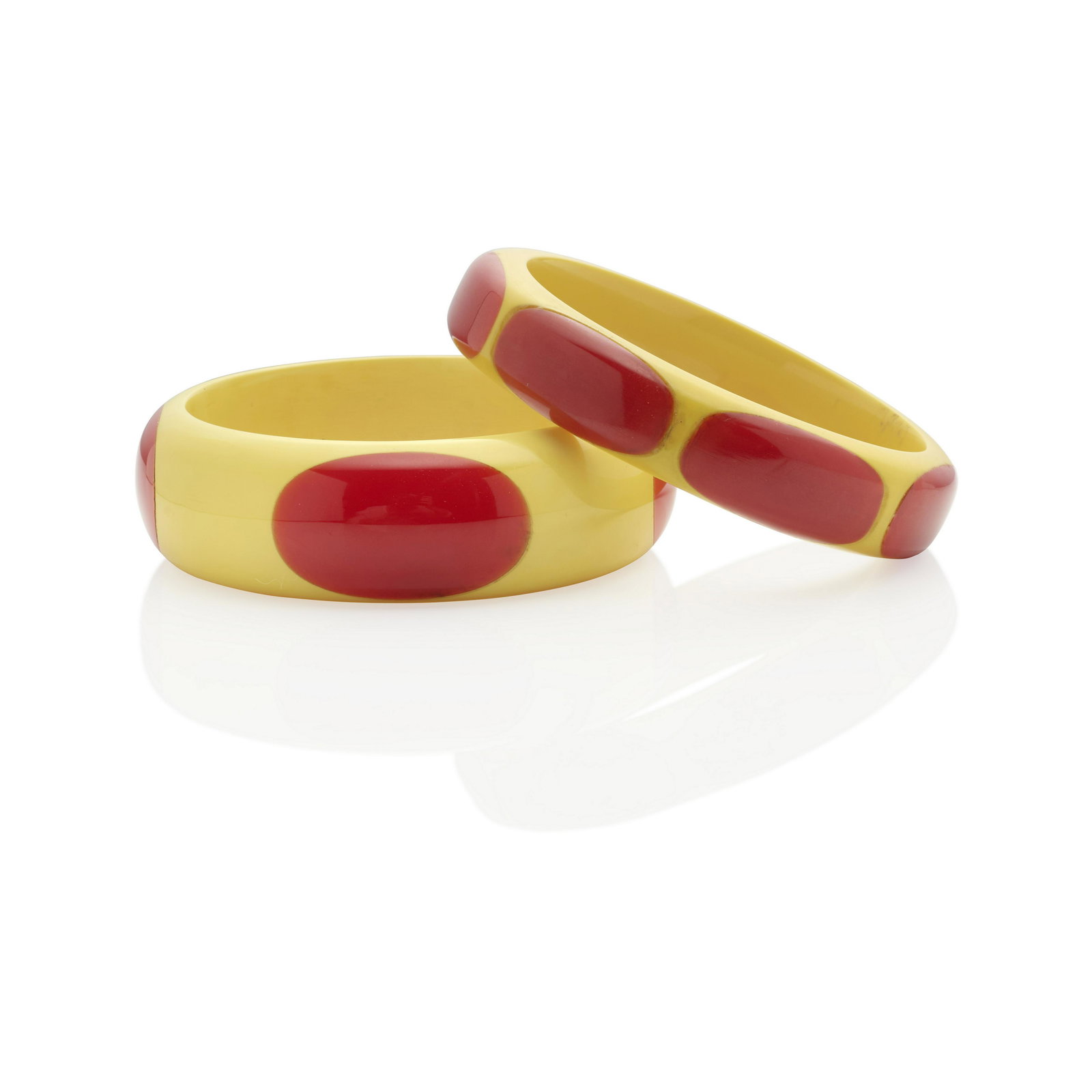 TWO BAKELITE CREAM AND RED ELONGATED 'DOT' BANGLE (1 of 1)