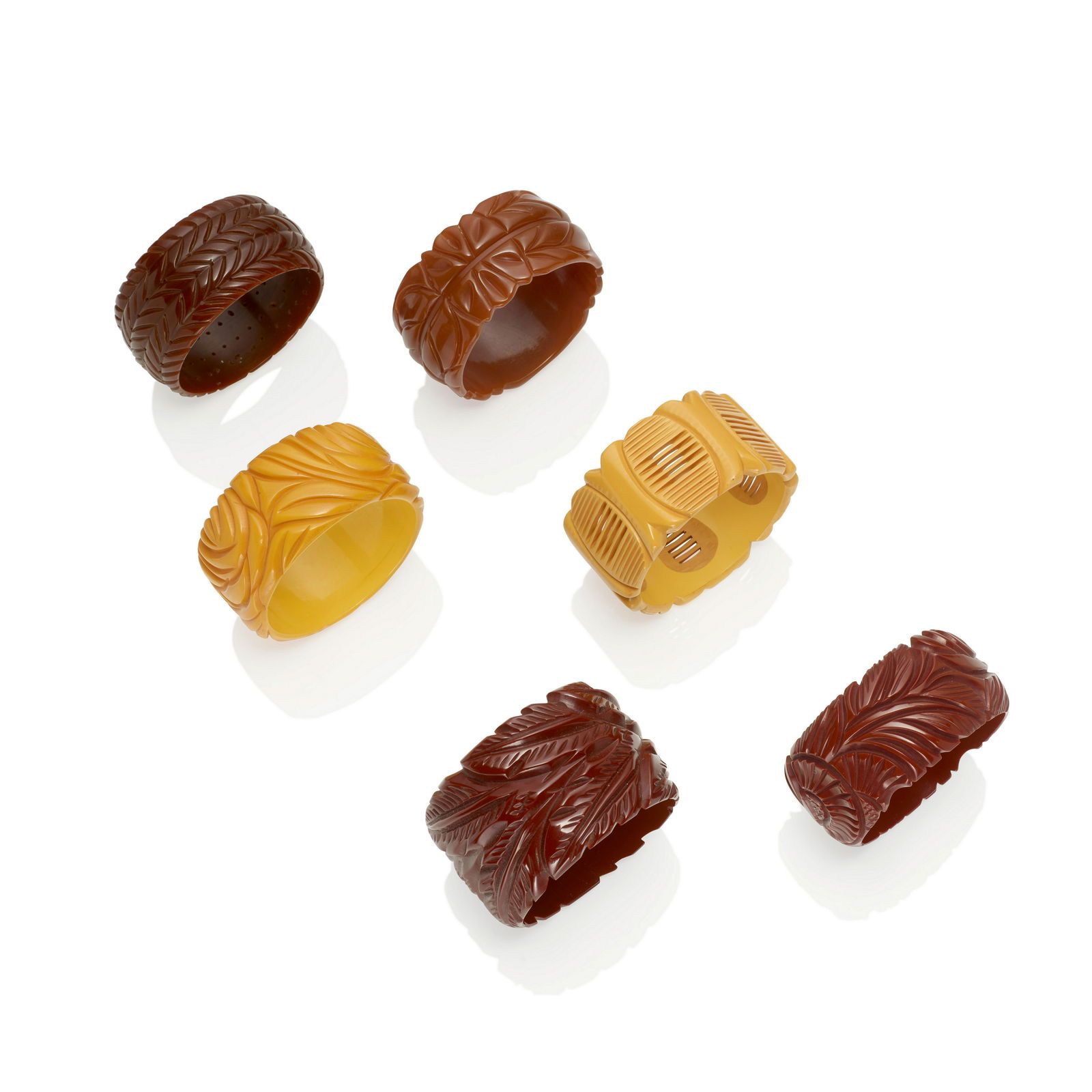 SIX BAKELITE CARVED BANGLE BRACELETS (1 of 1)