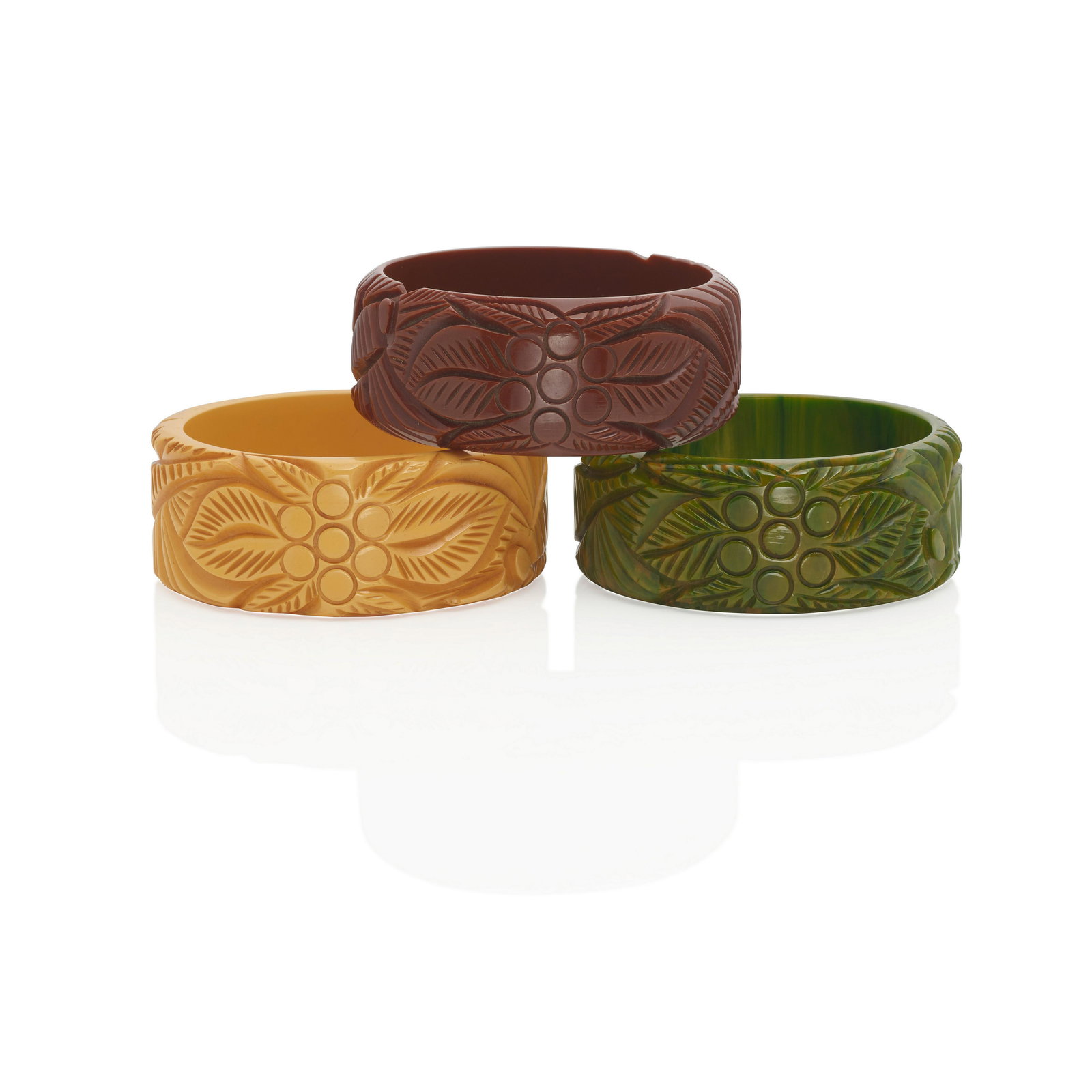 THREE BAKELITE CARVED 'FLOWER' BANGLE BRACELETS (1 of 1)