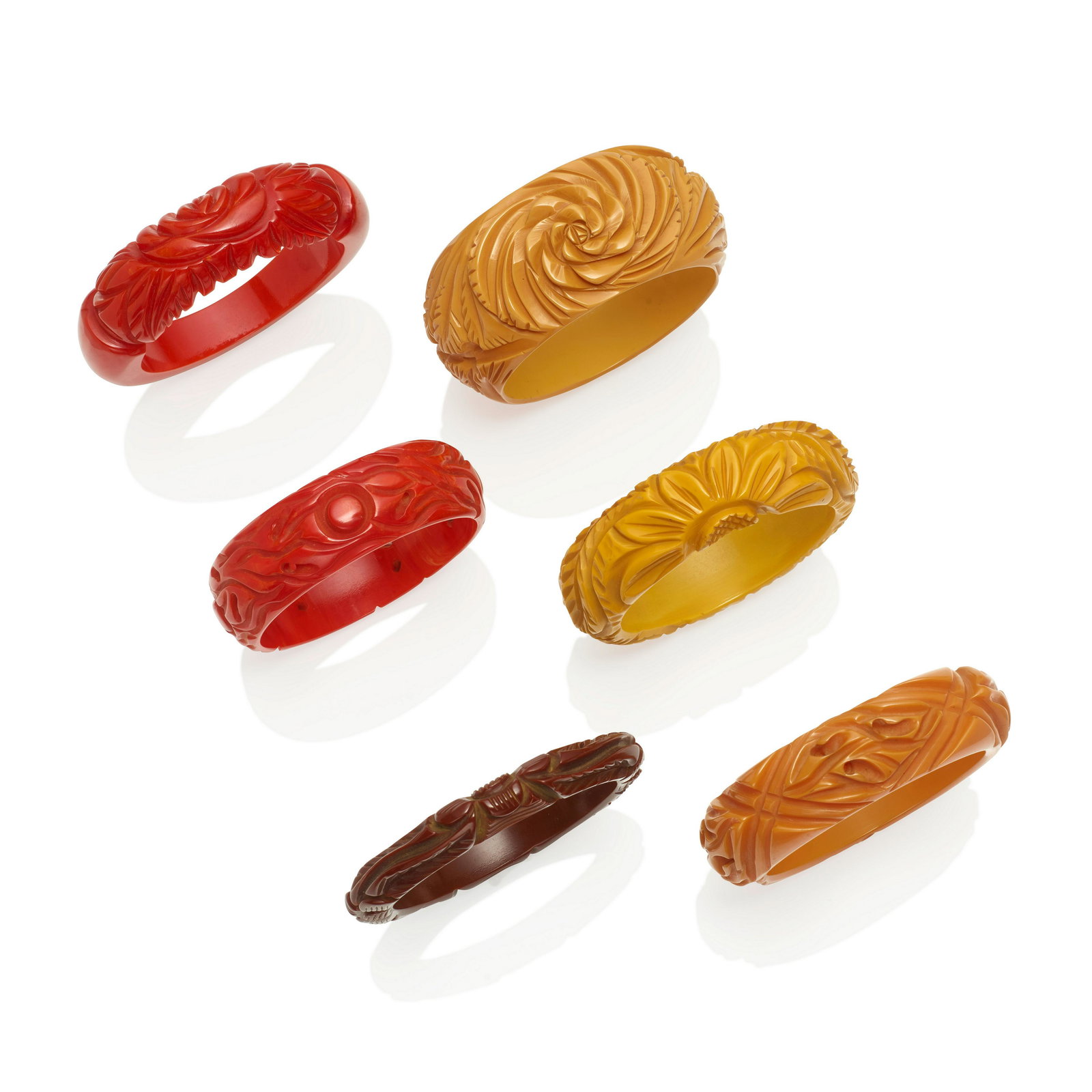 SIX BAKELITE CARVED BANGLE BRACELETS (1 of 1)