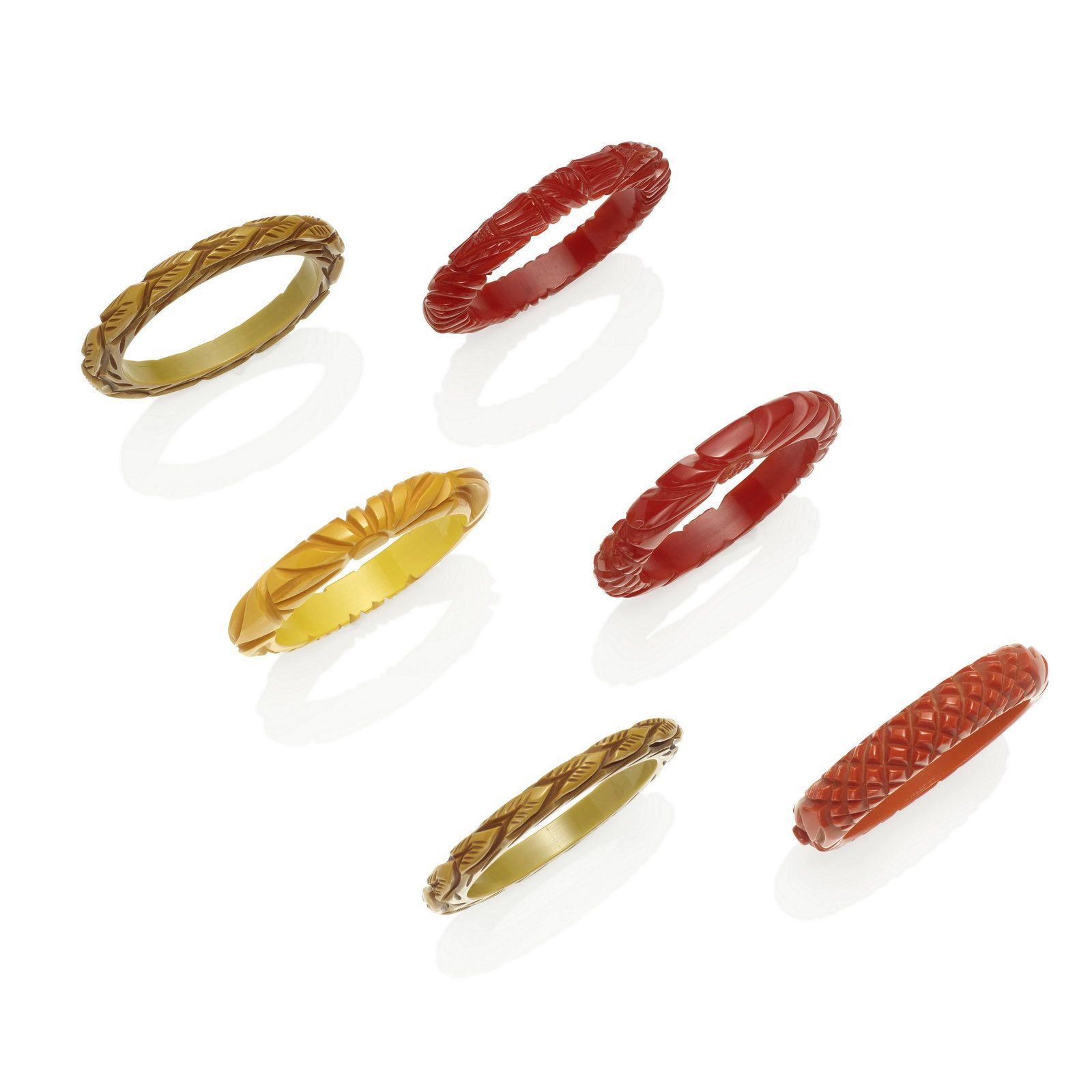SIX BAKELITE CARVED BANGLE BRACELETS (1 of 1)