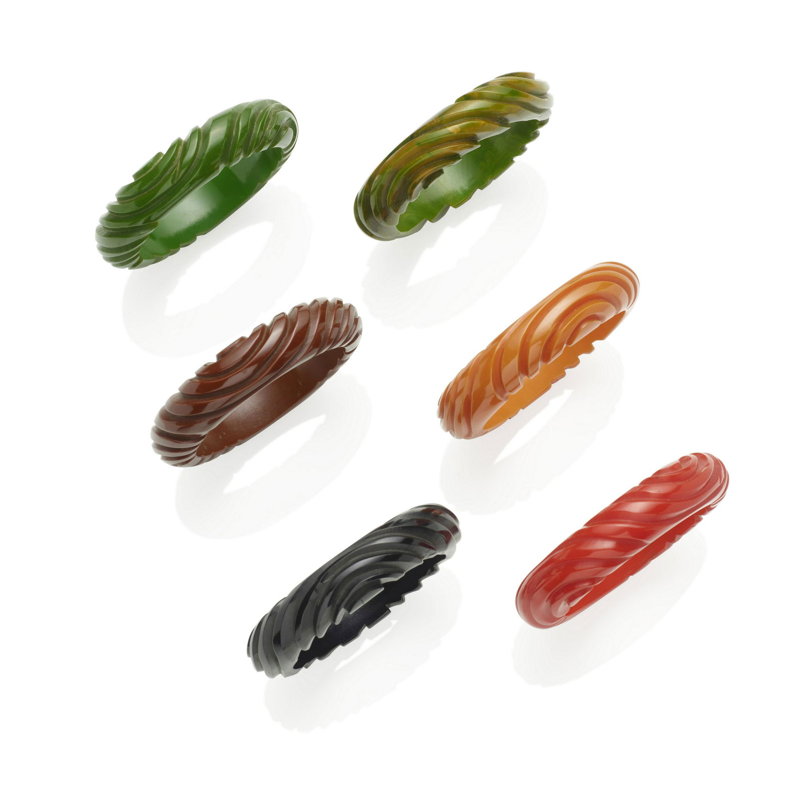 SIX BAKELITE CARVED BANGLE BRACELETS (1 of 1)