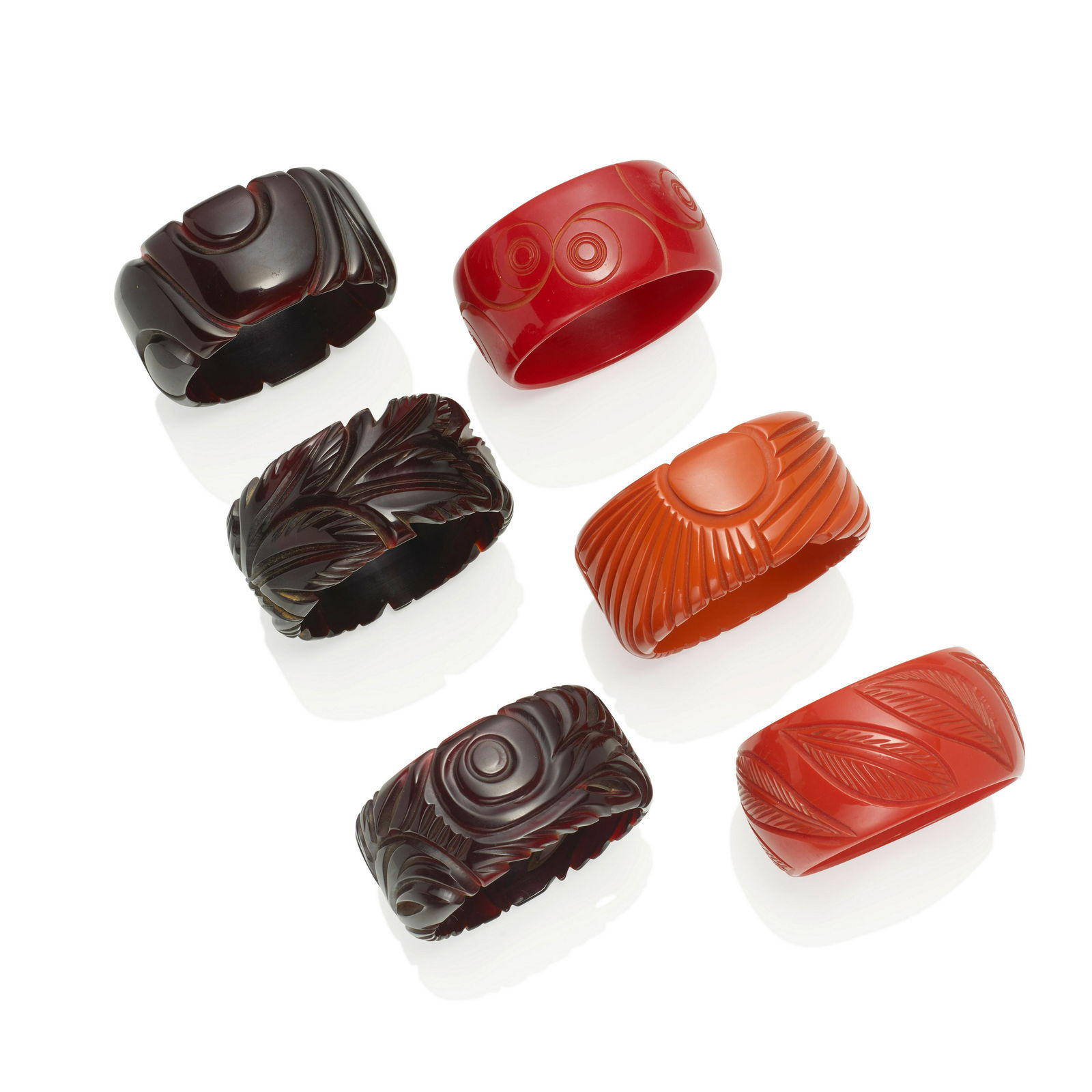 SIX BAKELITE CARVED BANGLE BRACELETS (1 of 1)