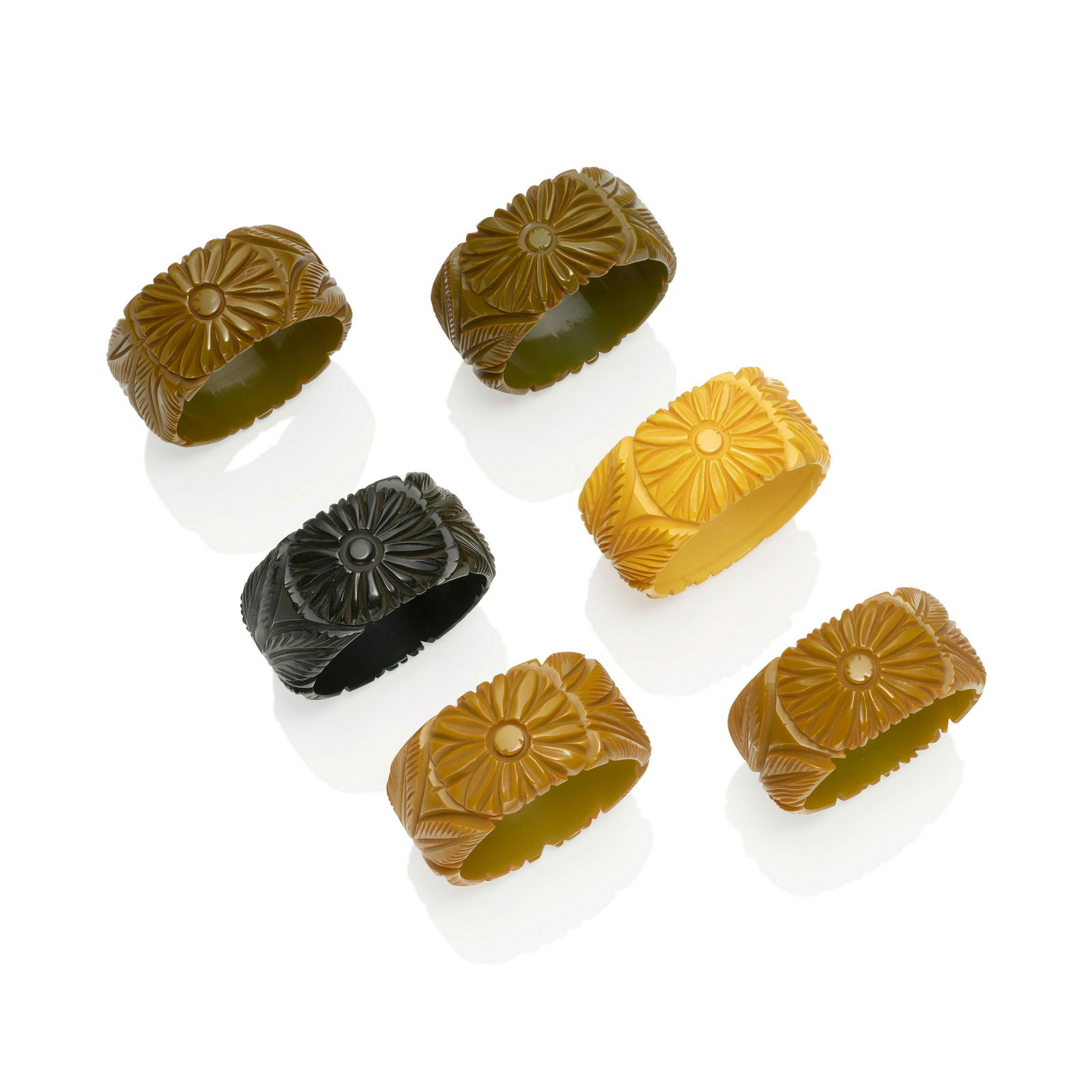 SIX BAKELITE CARVED BANGLE BRACELETS (1 of 1)