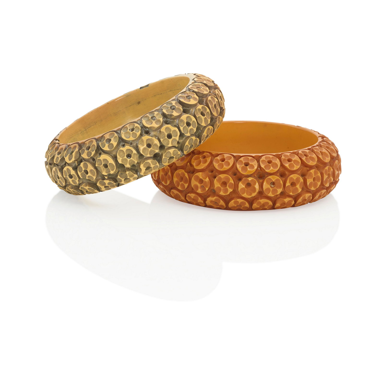 TWO BAKELITE CARVED 'OVERDYED' BANGLE BRACELETS (1 of 1)