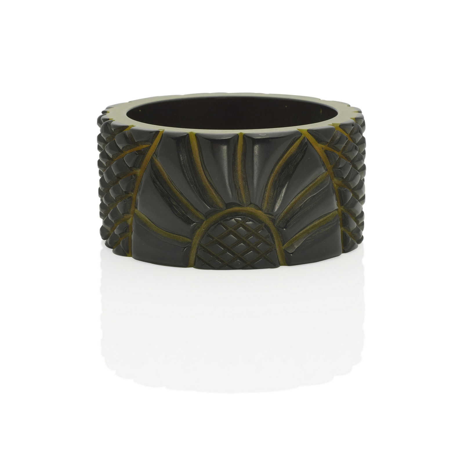 A BAKELITE GREEN AND BLACK CARVED LAMINATED 'FLOWER' (1 of 1)