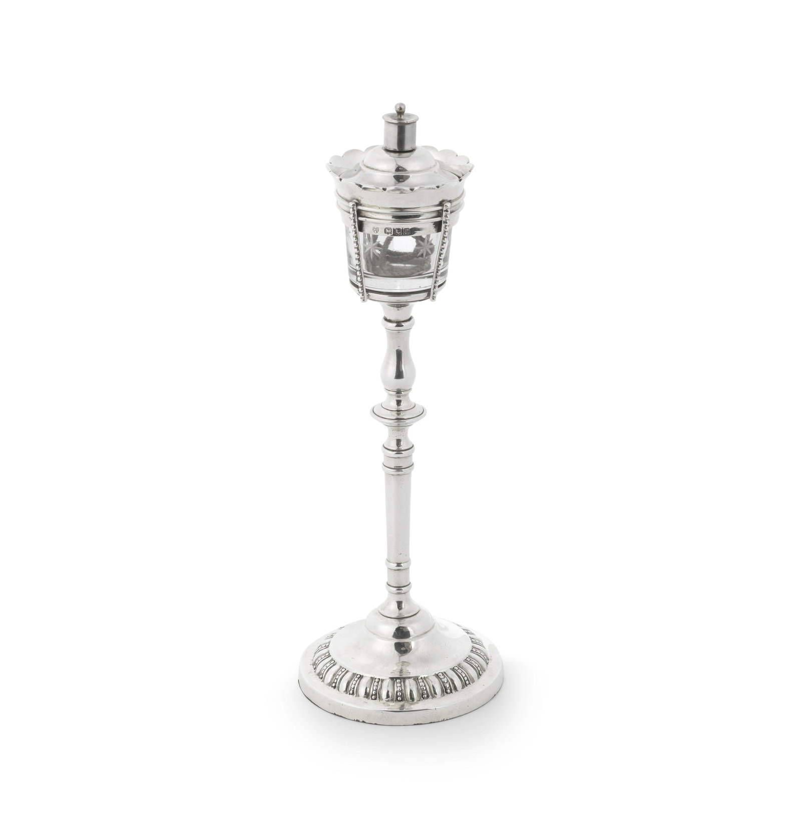 A novelty silver lighter Charles Stuart Harris, London: A novelty silver lighter Charles Stuart Harris, London 1916 Modelled as a streetlamp, the removable glass reservoir with a wick and screw-on cap, on a circular base, loaded, height 22cm.