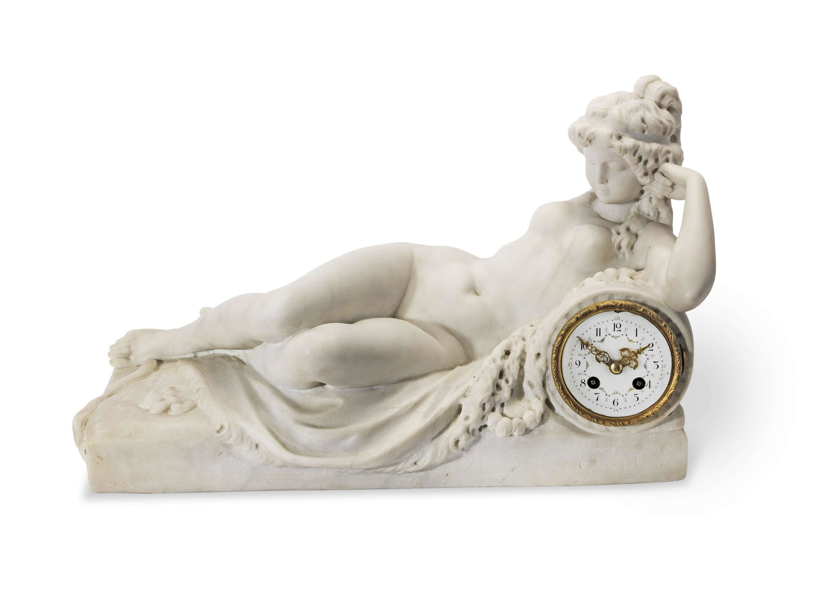 After Claude Michel Clodion (French, 1738-1814): A late: After Claude Michel Clodion (French, 1738-1814): A late 19th/early 20th century carved marble figural mantel clock the case inscribed D'apres Clodion the case carved as a reclining female nude, lying 