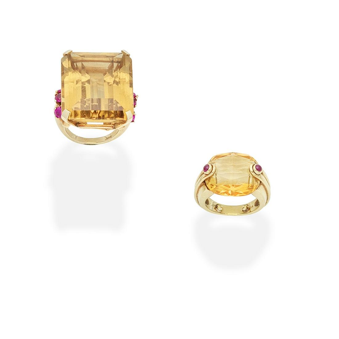 ANTONINI: CITRINE AND RUBY RING; CITRINE AND RUBY RING (2): ANTONINI: CITRINE AND RUBY RING; CITRINE AND RUBY RING 1st: Set with a fancy cut citrine accented by two cabochon rubies, 2nd: the step-cut citrine between trios of circular-cut rubies, 1st signed Ant