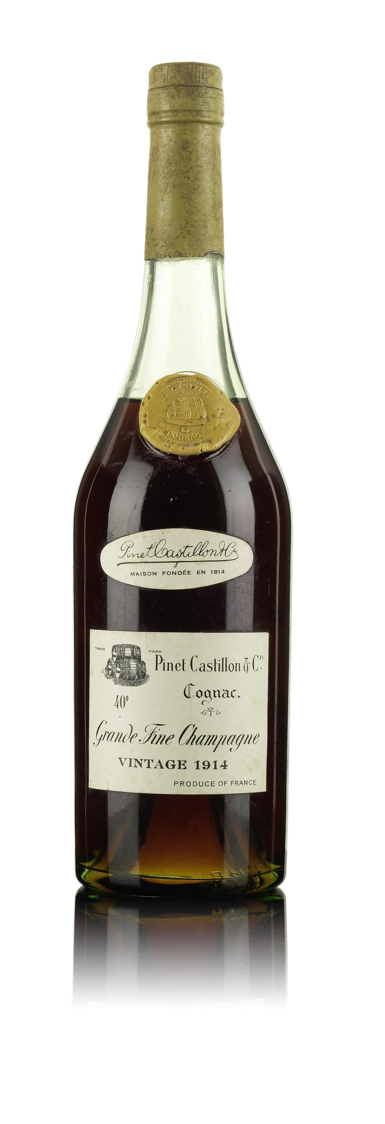 Pinet Castillon-1914: Pinet Castillon-1914 Grande Fine Champagne. Shoulder wax button creased and slightly chipped. Front labelling slightly rubbed. Level: top shoulder. Cognac, no spirit strength or capacity stated on lab
