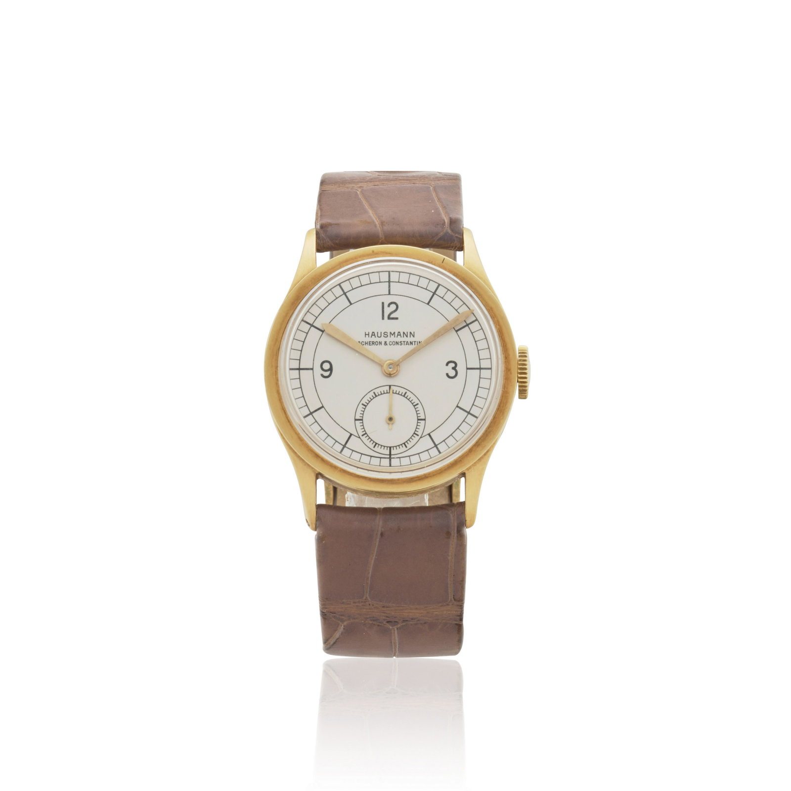 VACHERON CONSTANTIN. AN 18K GOLD WRISTWATCH RETAILED BY HAUSMANc.1935: VACHERON CONSTANTIN. AN 18K GOLD WRISTWATCH RETAILED BY HAUSMAN Date: c.1935 Movement: Manual wind, No.416468 Dial: Silvered, black Arabic quarter numerals, black minute track, gilt sword hands, subsi