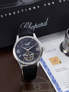 CHOPARD. A 18K WHITE GOLD AND DIAMOND PIECE UNIQUE MANUAL WIND WRISTWATCH WITH TOURBILLON AND PO...