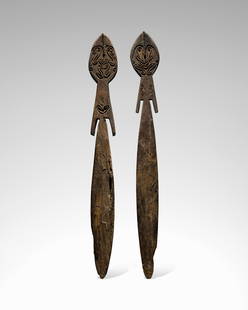 Rare Male and Female Spirit Board Couple, probably Mina Goiravi Village, Papuan Gulf, Papua New...: Rare Male and Female Spirit Board Couple, probably Mina Goiravi Village, Papuan Gulf, Papua New Guineagope Light brown wood with natural pigmentsHeights 44 and 44 1/4in (112 and