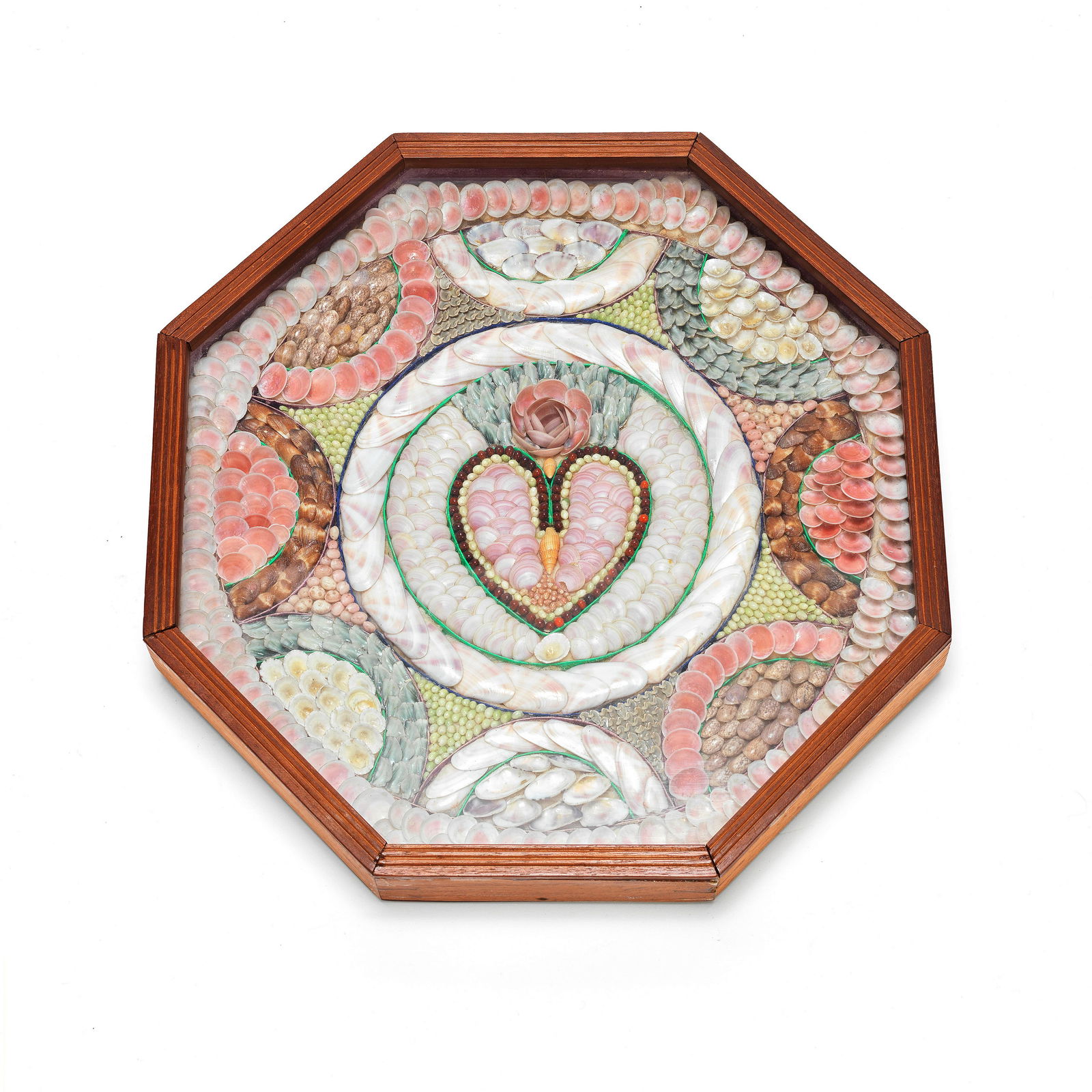 A Large Shell-Work Sailor's Valentine, 19th century, 15in (38cm) wide: A Large Shell-Work Sailor's Valentine, Barbadian, 19th century, the octagonal mahogany case mounted with geometric designs comprising white, pink, green, and lilac shells, with love heart motif to the
