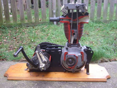 A 1930's BSA 250cc cutaway engine and gearbox: A 1930's BSA 250cc cutaway engine and gearboxwith operational valves, gears and clutch, mounted on a pine plinth measuring 30' long, 8½' wide and 20' tall, believed to be a 1935 model B35-2 OHV
