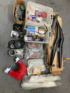 A quantity of mainly Yamaha and Honda spares ((Qty)): A quantity of mainly Yamaha and Honda sparesincluding speedometers, a Yamaha 'YPVS' belly pan, gaskets, cables (some NOS), exhaust pipes believed suitable for RD models, silencers and other sundry