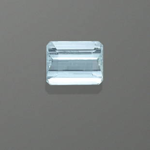 Aquamarine: AquamarineA fine, rectangular, cushion-cut aquamarine having a checkerboard-cut crown and concave-cut facets to the pavilion which provide an added measure of scintillation to the stone, which