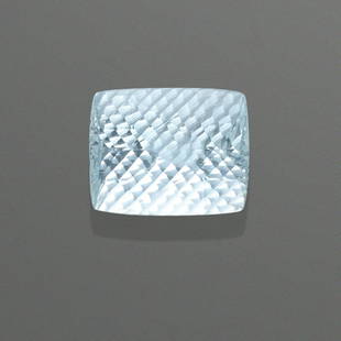 Fancy-cut Aquamarine: Fancy-cut AquamarineBrazil A rectangular shaped aquamarine with checkerboard-faceted crown and concave-cut pavilion with very good clarity and luster. Of suitable size for mounting as a pendant. 