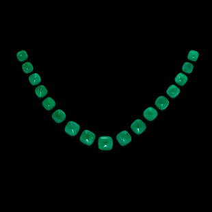 Suite of Seventeen Emerald Cabochons: Suite of Seventeen Emerald CabochonsRussiaA suite of seventeen emerald sugarloaf cabochons with attractive leafy green hues and good transparency. The weights of the seventeen cabochons are as