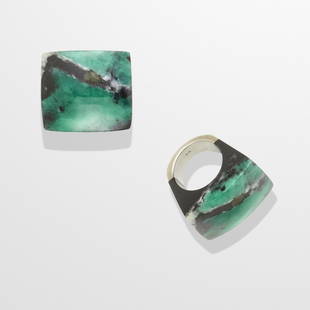 Emerald-in-Matrix and Silver Ring: Emerald-in-Matrix and Silver RingBahia, Brazil Carved from a single specimen of vivid green emerald with associated minerals of white quartz and black schist matrix, polished in dome form to the top