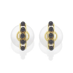 ALDO CIPULLO FOR CARTIER: ROCK CRYSTAL AND ONYX BEAD EARCLIPS, 1972: ALDO CIPULLO FOR CARTIER: ROCK CRYSTAL AND ONYX BEAD EARCLIPS, 1972Each rock crystal disc, accented by five onyx beads, signed Cartier and A. Cipullo, dated 1972, length 6.7cmFootnotes:Provenance:A