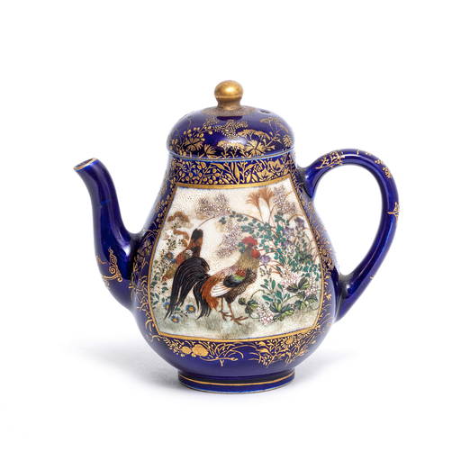 A SMALL BLUEGROUND SATSUMA TEAPOT AND COVER By Kinkozan, Meiji Period