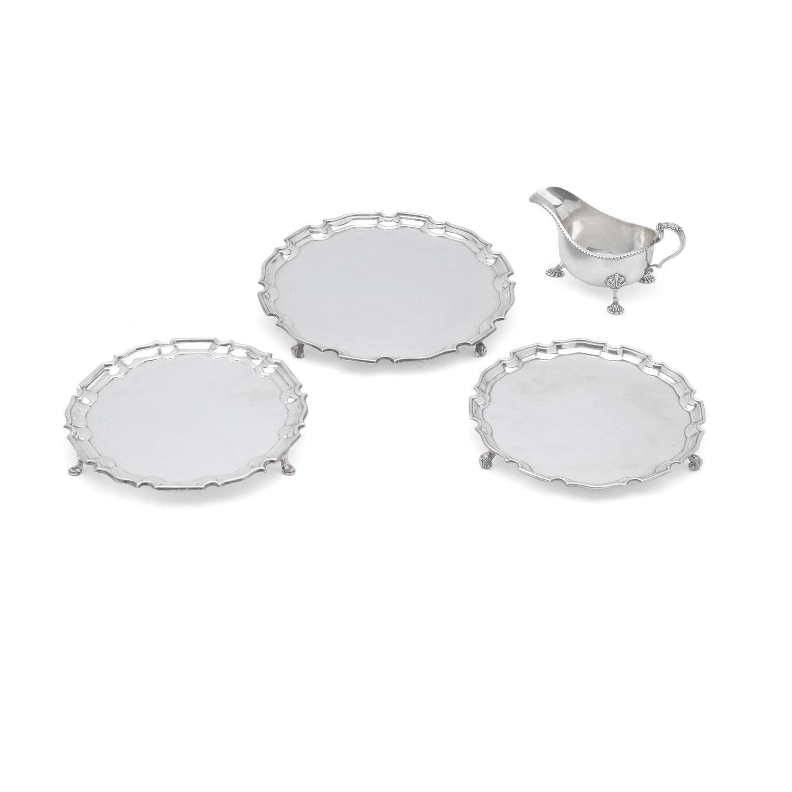 THREE ENGLISH SILVER FOOTED SALVERS by various makers, London, 1954-1962 (1 of 1)
