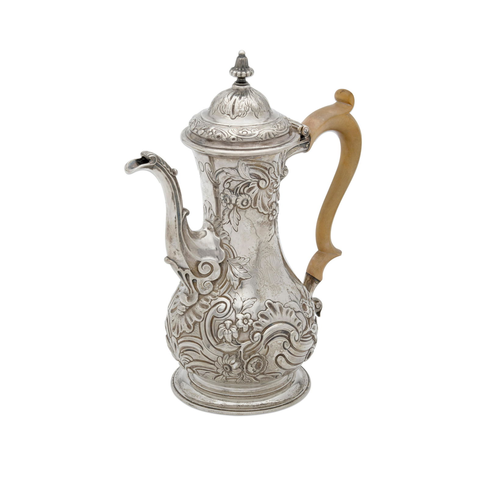 A GEORGE III REPOUSSÉ SILVER COFFEE POT by Alexander Johnston, London, 1769 (1 of 2)