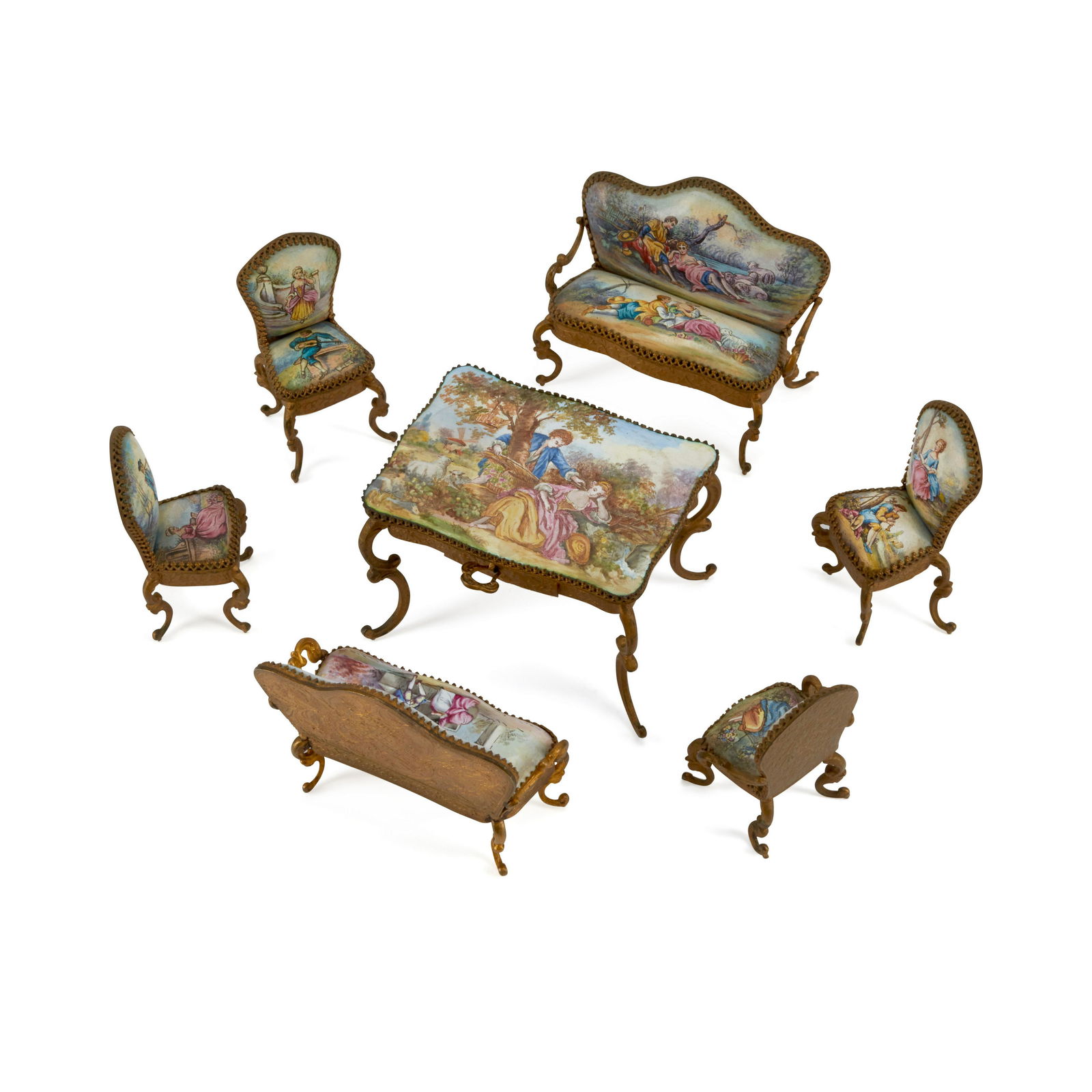 AN ASSEMBLED AUSTRIAN ENAMEL AND GILT METAL MINIATURE FURNITURE SUITE: AN ASSEMBLED AUSTRIAN ENAMEL AND GILT METAL MINIATURE FURNITURE SUITE Comprising a table, four chairs, and two settees. (7)
