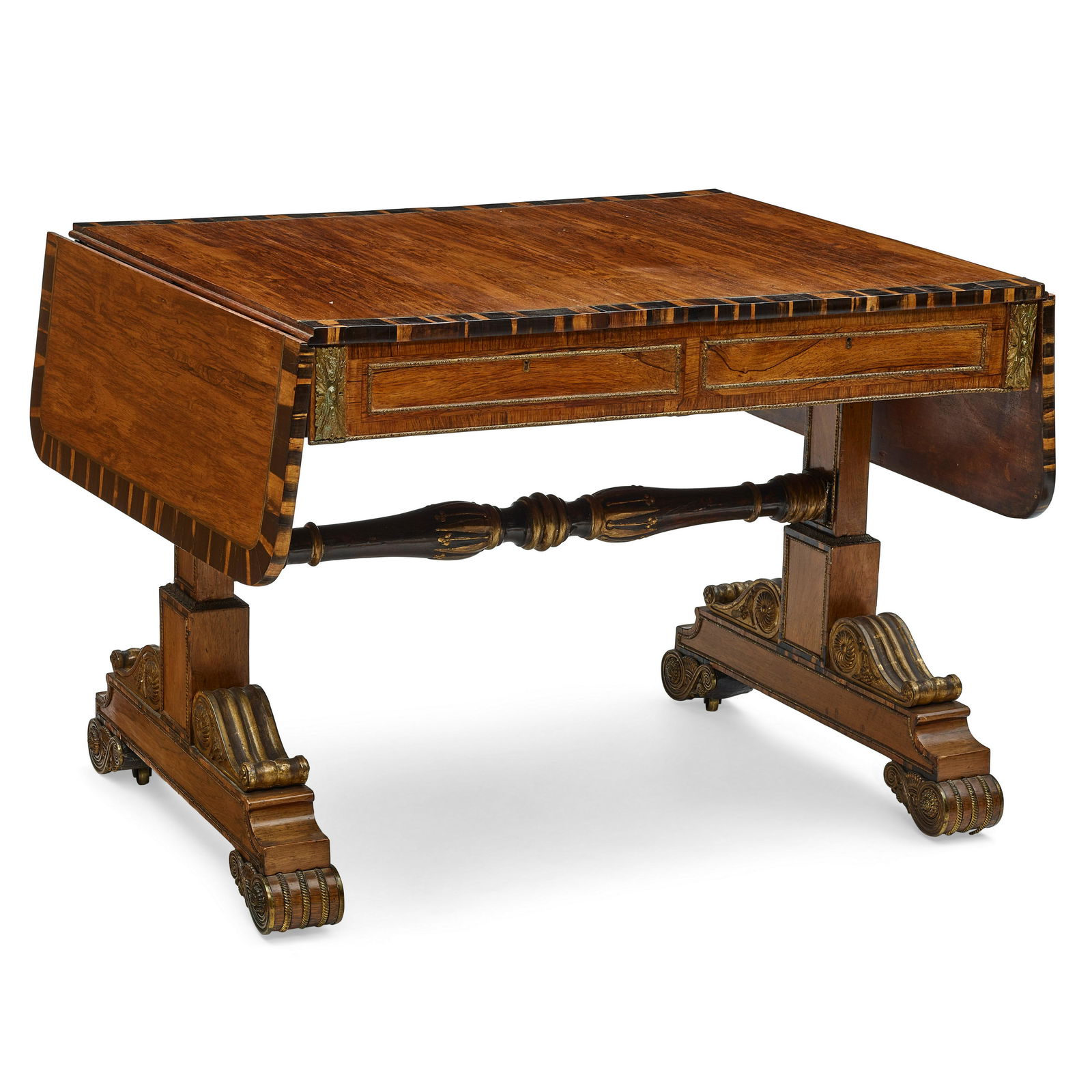 A REGENCY BRASS INLAID AND GILT BRONZE MOUNTED EXOTIC WOOD SOFA TABLEGillows, designed by George... (1 of 2)