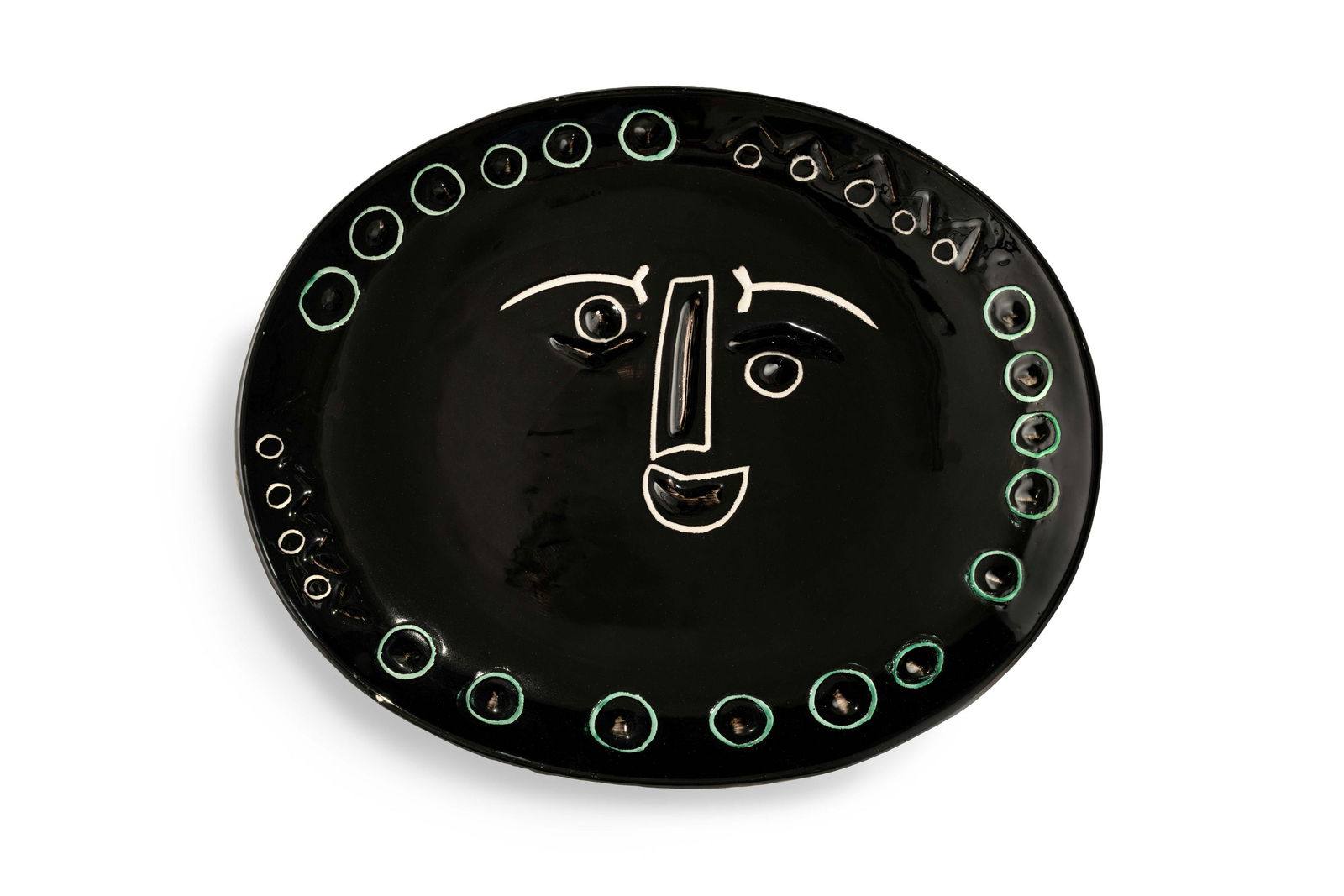 Pablo Picasso (1881-1973) Visage dans un ovale, 1955 Diameter 39.5cm (15 5/8in).  (Conceived on ... (1 of 2)