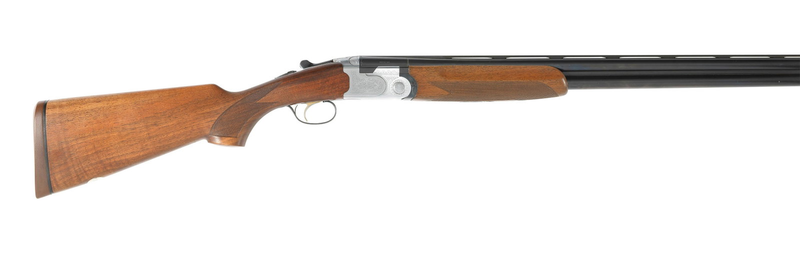 A 12-bore 'Mod. S686 Special' single-trigger over-and-under ejector gun by Beretta, no. E24962B ...: A 12-bore 'Mod. S686 Special' single-trigger over-and-under ejector gun by Beretta, no. E24962B Hold-open toplever, bouquet and foliate-scroll engraving, the underside engraved 'P. Beretta, Gardone V.