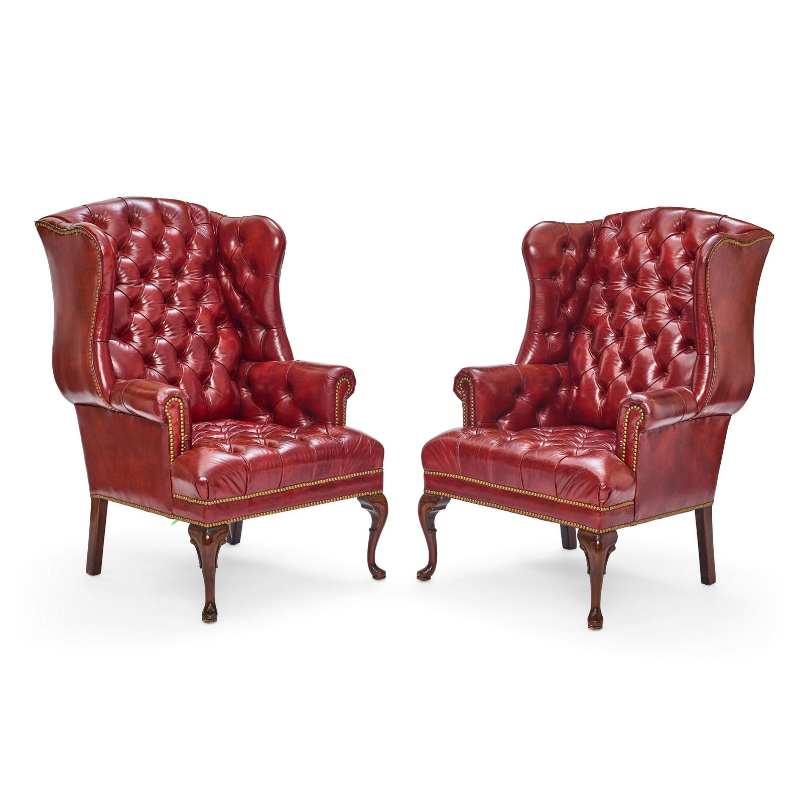 A PAIR OF GEORGE III STYLE UPHOLSTERED WING CHAIRS20th century (1 of 2)