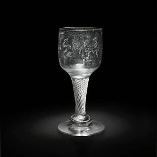 A very rare Dutch stipple-engraved goblet by J Wolff, circa 1760: A very rare Dutch stipple-engraved goblet by J Wolff, circa 1760 The ovoid bowl delicately engraved with a tavern scene with features partially outlined in diamond-point, the scene depicting four figu