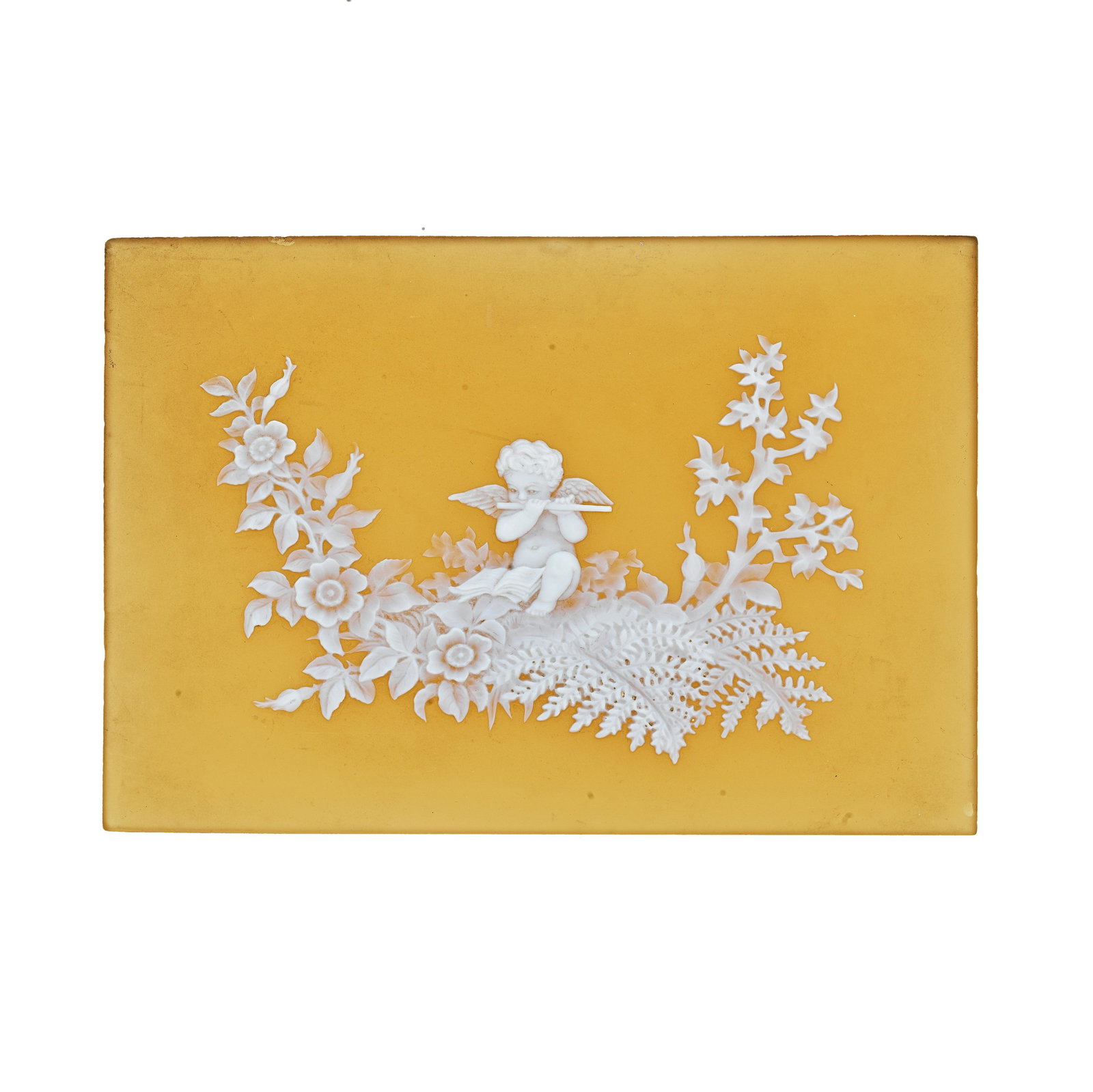 A Thomas Webb and Sons cameo glass plaque attributed to George Woodall, circa 1880-90: A Thomas Webb and Sons cameo glass plaque attributed to George Woodall, circa 1880-90 The small rectangular panel in topaz coloured glass, cased in white and carved with a winged Cupid playing a flute
