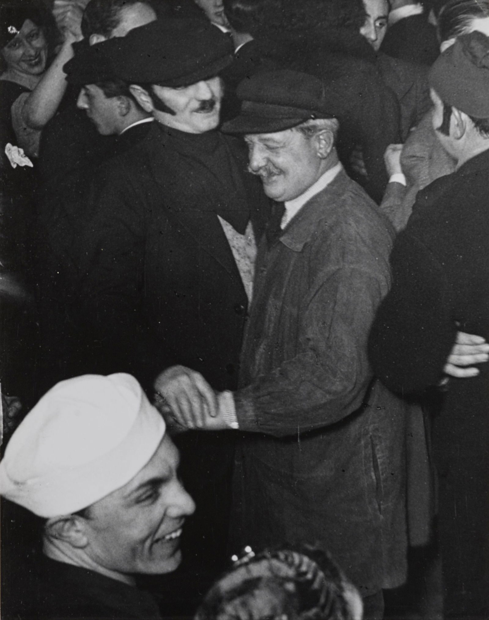 Brassaï (1899-1984); La Bal de la Montagne, Sainte-Geneviève;: Brassaï (1899-1984) La Bal de la Montagne, Sainte-Geneviève, c. 1932 Gelatin silver print, printed 1950s, signed, negative notation 'Pl. 448' in pencil/ ink, '81 Faubourg St-Jacques' credit