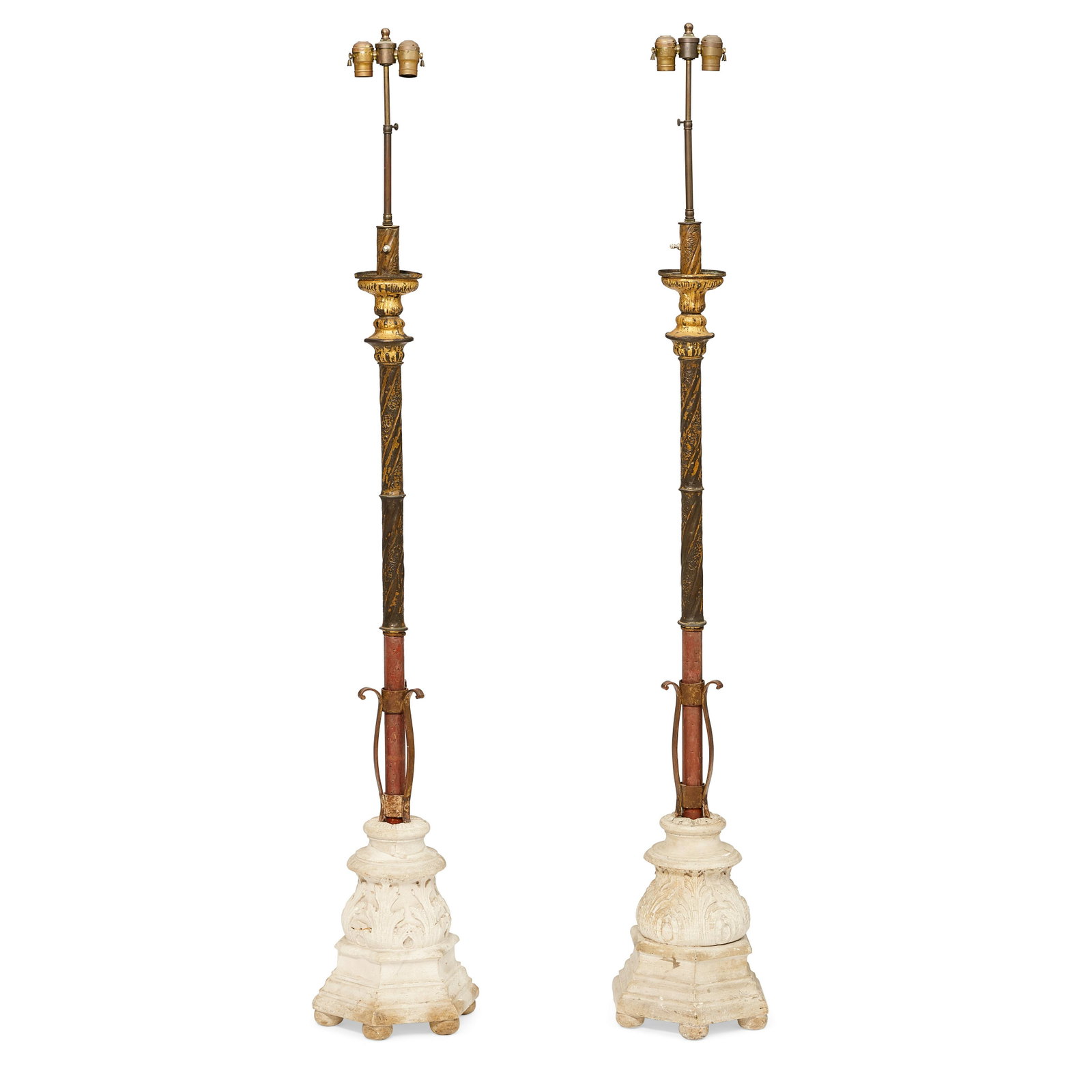 A PAIR OF ITALIAN BAROQUE GILT METAL AND CARVED STONE TORCHÈRESCirca 1680: A PAIR OF ITALIAN BAROQUE GILT METAL AND CARVED STONE TORCHÈRES Circa 1680 height 69in (107.5cm) Footnotes: Provenance Arthur Davidson Ltd., London, 27 May 1981. This lot is subject to the follow