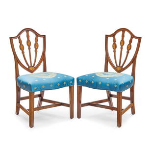 A PAIR OF FEDERAL MAHOGANY INLAID SHIELD BACK SIDE CHAIRSMassachusetts, circa 1785: A PAIR OF FEDERAL MAHOGANY INLAID SHIELD BACK SIDE CHAIRS Massachusetts, circa 1785 height 39in (99.1cm); width 21in (53.3cm); depth 18in (45.7cm) Footnotes: Provenance Bernard and S. Dean Levy, New Y