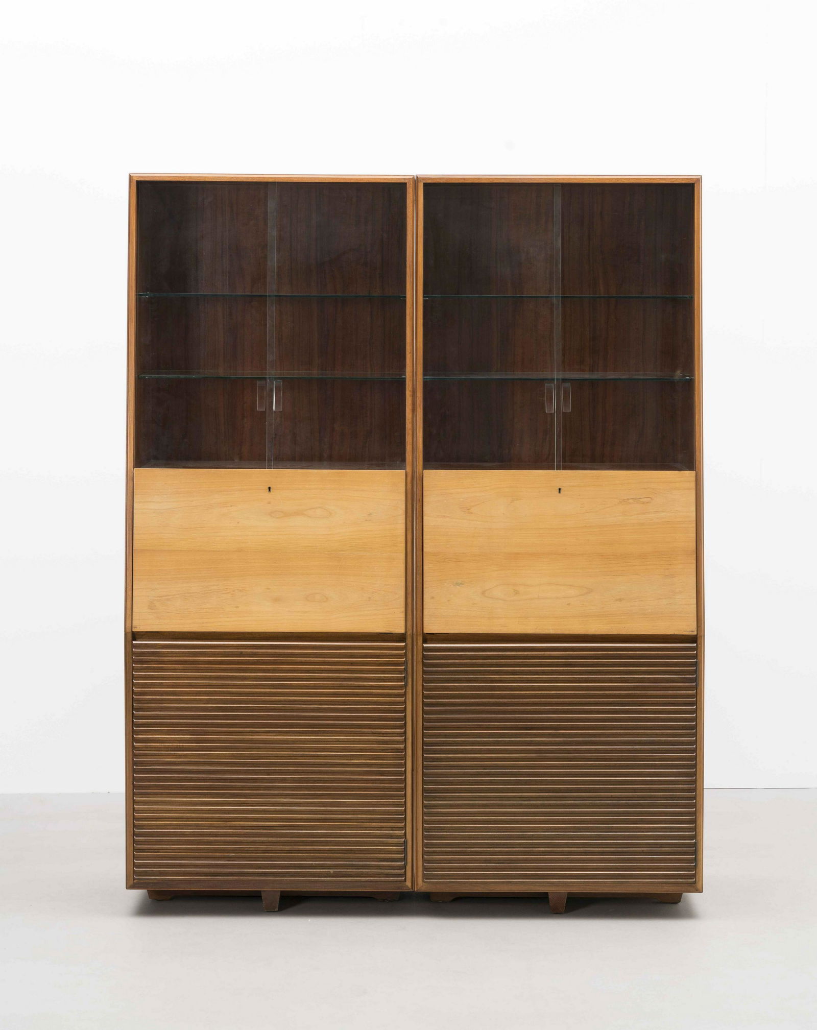 Robin Day Two rare cocktail units, model no. 652, designed for the 'Furniture Trades Exhibition'...: Robin Day Two rare cocktail units, model no. 652, designed for the 'Furniture Trades Exhibition', Earl's Court, London, 1951 Sycamore, sycamore-veneered plywood, glass. Each: 183 x 71 x 44 cm Manufact