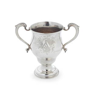 An early George III silver two-handled trophy William Grundy, London 1764: An early George III silver two-handled trophy William Grundy, London 1764 Inverted and waisted pear shape, with leaf-capped scroll handles either side of a plain polished body, the front with an engr